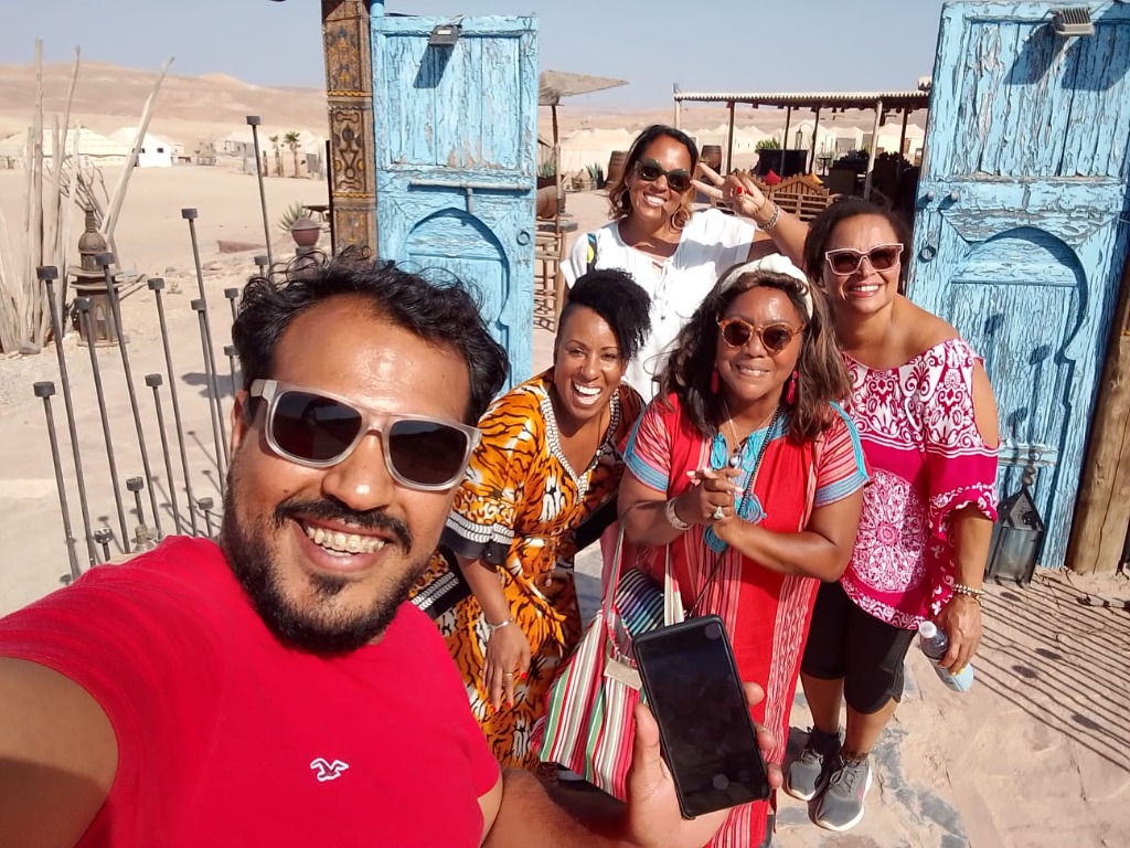 Group selfie with travelers and local guide